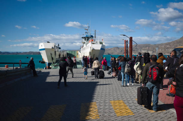 Boarding queue to ferry on General Carrera lake stock photo