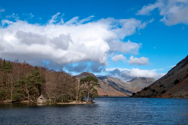 Boat House on Wast Water with Great Gable Scenic in English Lake District with boathouse on water and mountains beyond. yew lake stock pictures, royalty-free photos & images