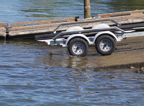Boat Trailer Entering Water stock photo