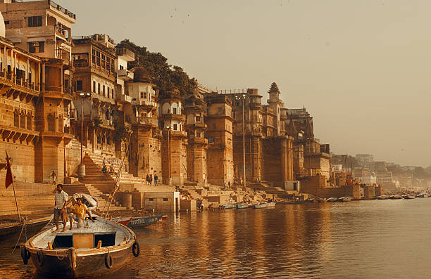 Boat with Guys in Varanasi varanasi stock pictures, royalty-free photos & images