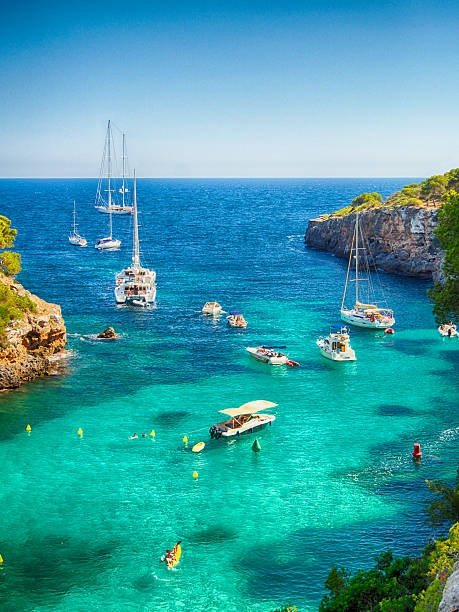 Boats and blue sea in Majorca stock photo
