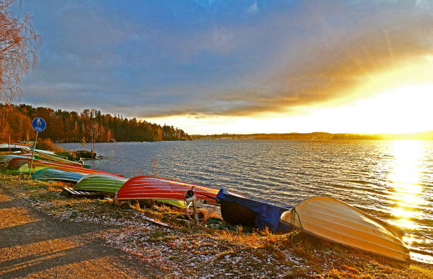 Boats by Lake in Finland stock photo