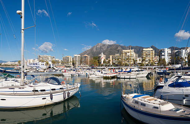 Boats moored in Marbella marina in Andalusia, Spain Boats moored in Marbella marina in Andalusia, Spain marbella stock pictures, royalty-free photos & images
