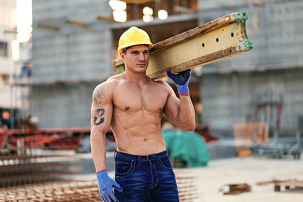 Handsome Muscular Construction Worker Standing Stock Photo 