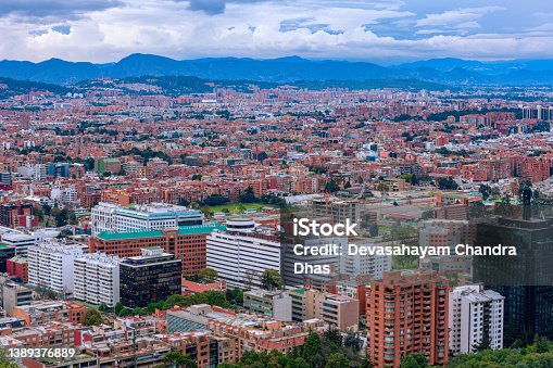 istock Bogota, Colombia - High Angle Panoramic View Of The Andean Capital City From The Heights Of La Calera On The Andes, Just Before Sunset Time 1389376889