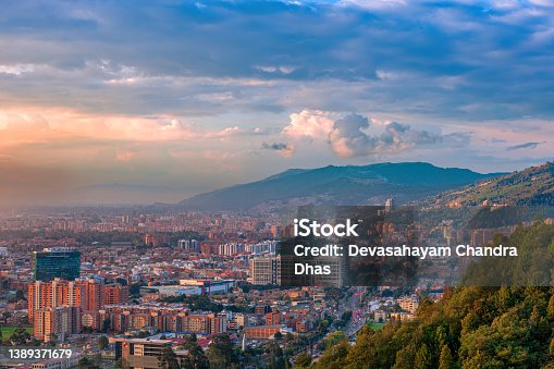 istock Bogota, Colombia - High Angle Panoramic View Of The Barrio De Usaquén In The Capital City As Viewed From La Calera On The Andes Mountains At Sunset. 1389371679