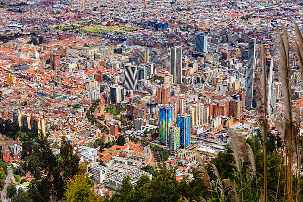 Bogota, Colombia: The Andean Capital City As Viewed From Monserrate; To The Left Is Historic La Candelaria And To The Right The Modern Down Town Area stock photo