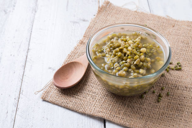 Boiled green mung beans with sugar syrup stock photo