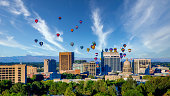 istock Boise city skyline with hot air balloons and blue sky 1284589564