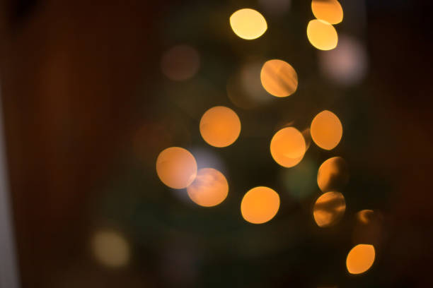 Bokeh of Christmas tree with lights and decorations with soft focus stock photo