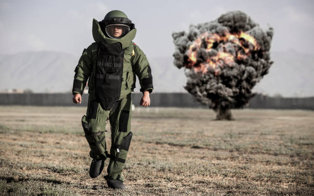 EOD Expert walking away from the Ordnance Disposal site when the explosion happening.