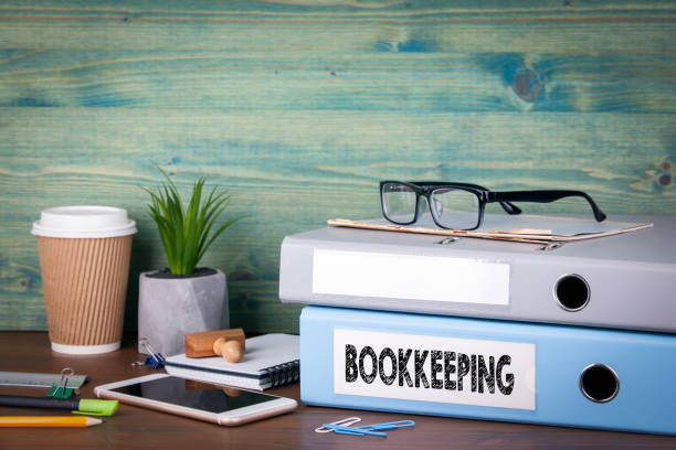 bookkeeping concept. Binders on desk in the office. Business background stock photo