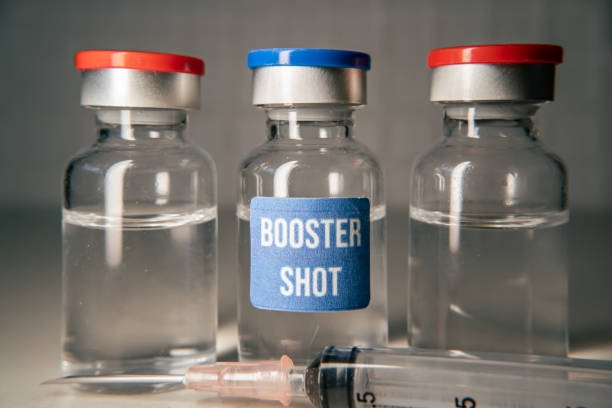 Booster shot covid-19 vaccine concept stock photo