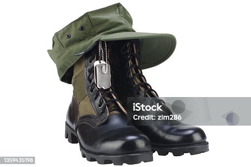 istock U.S. MARINES boots and cap with dog tags isolated on white background 1359435198