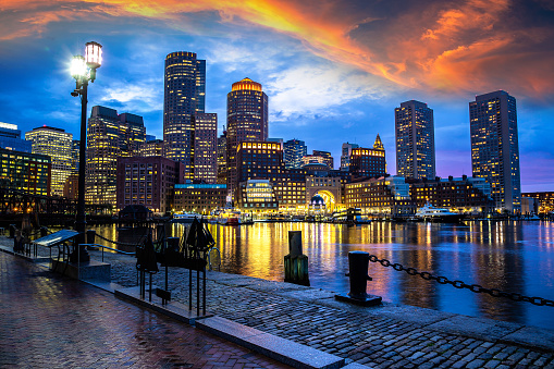 Panoramic view of Boston cityscape at Fan Pier Park 
at night, USA