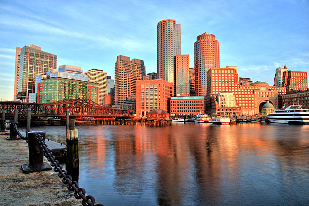 Boston Skyline with Financial District and Boston Harbor at Sunrise stock photo