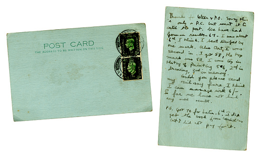 Both sides of a handwritten postcard with stamps from the reign of King George VI (Cheltenham schoolgirl)