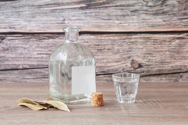 Bottle and glass with schnapps stock photo