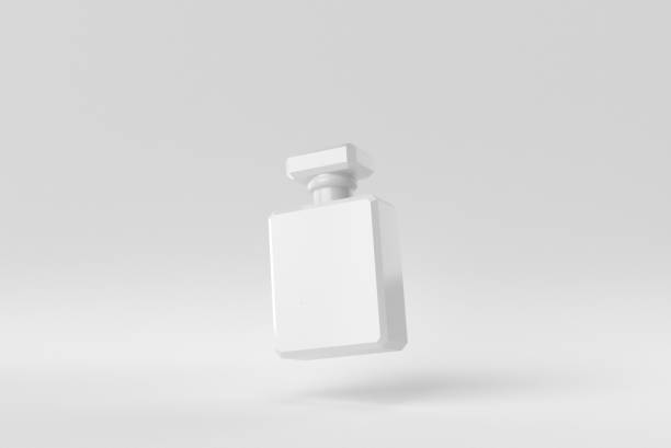 Bottle of essence perfume on a white background. minimal concept. monochrome. 3D render. Bottle of essence perfume on a white background. minimal concept. monochrome. 3D render."r"n best perfumes stock pictures, royalty-free photos & images