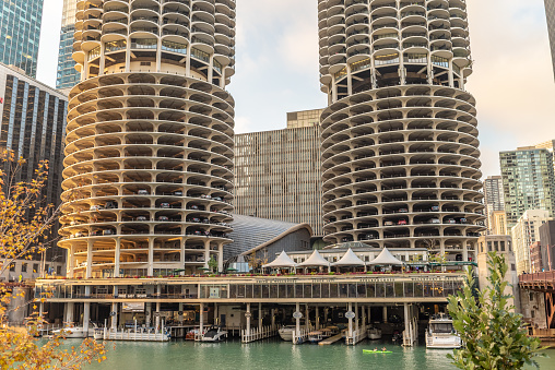 Chicago, IL - September 28, 2021: View of the Bottom half of the iconic Marina Towers, with the Chicago River below, downtown in the Loop.
