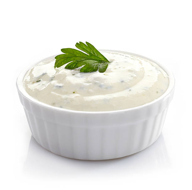 Bowl of fresh garlic dip Bowl of fresh garlic dip on white background dill stock pictures, royalty-free photos & images