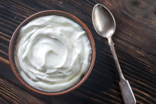Bowl of Greek yogurt stock photo