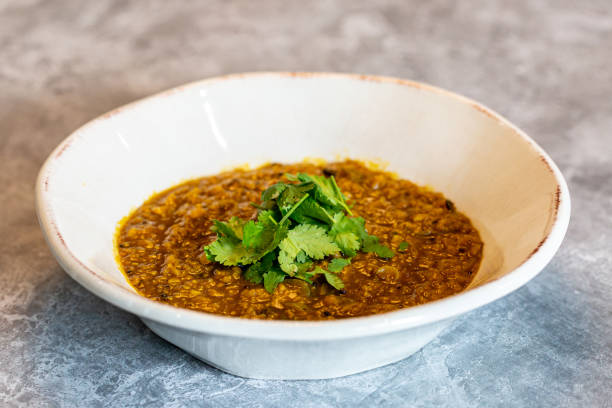 A bowl of lentil curry stock photo