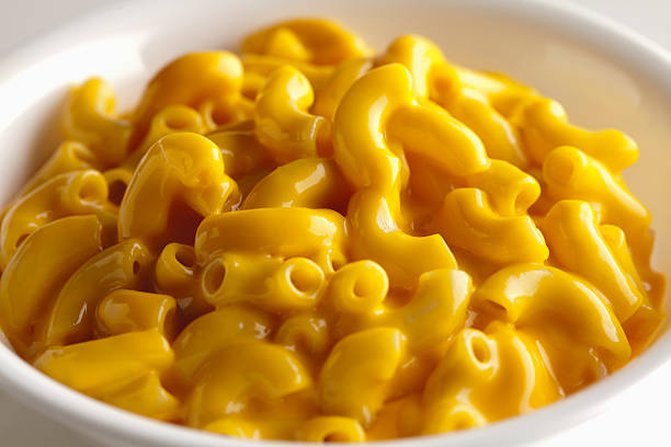 Bowl of Macaroni and Cheese  macaroni stock pictures, royalty-free photos & images