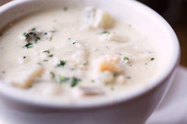 Bowl of New England clam chowder stock photo