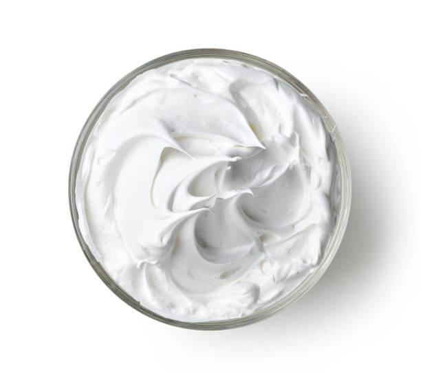 bowl of whipped egg whites cream stock photo