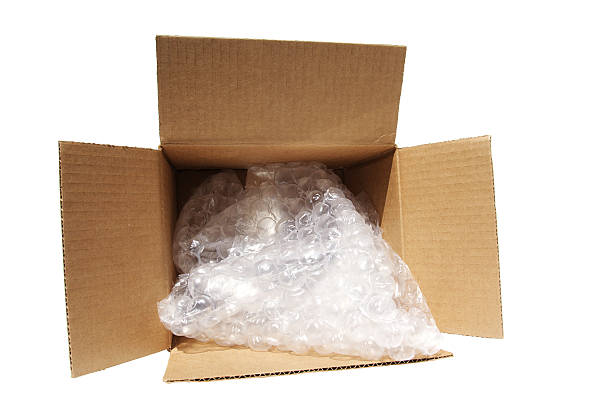 box, bubble wrap and clipping path stock photo