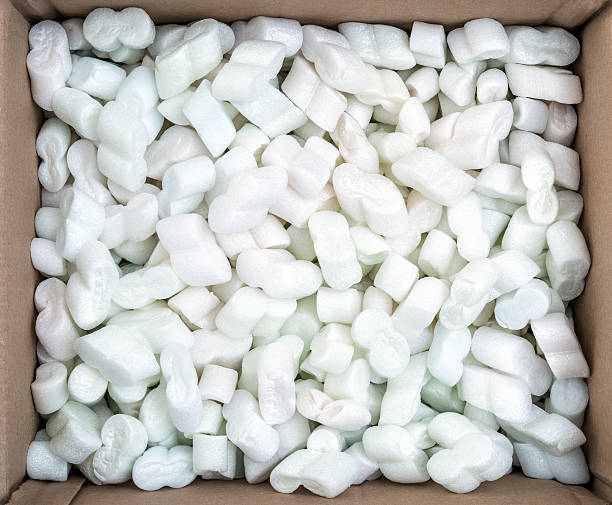 box filled with packing material - polystyreen stockfoto's en -beelden
