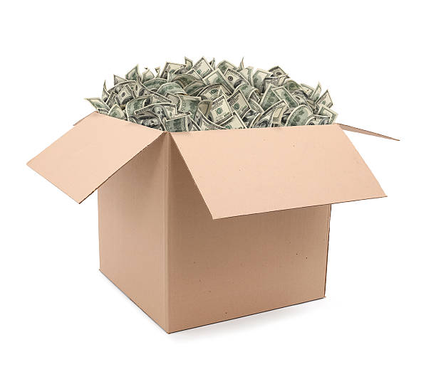 Box Overflowing With Money stock photo
