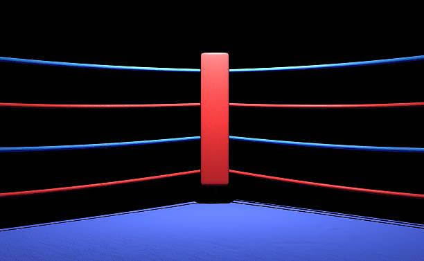 Boxing ring red corner in dark background Boxing ring red corner in dark background, 3D render boxing ring stock pictures, royalty-free photos & images