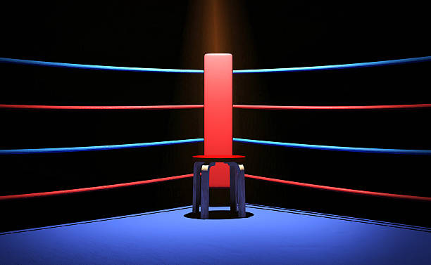 Boxing ring with chair at the corner Boxing ring with chair at the corner, 3D render boxing ring stock pictures, royalty-free photos & images