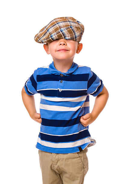 Boy and cloth cap stock photo