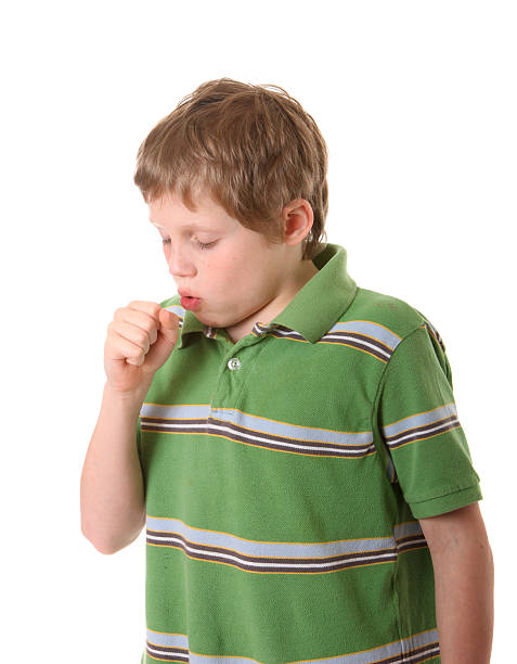 boy coughing stock photo
