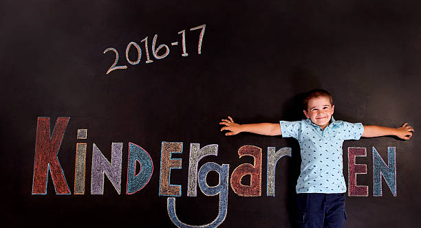boy kindergartener on chalkboard - 6 7 ��r bildbanksfoton och bilder