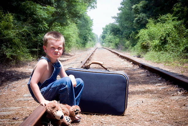 boy on tracks - teddy ray stok fotoğraflar ve resimler
