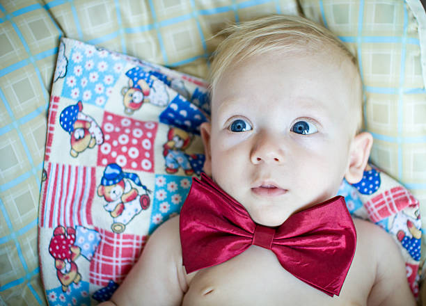 Boy wears bowtie stock photo