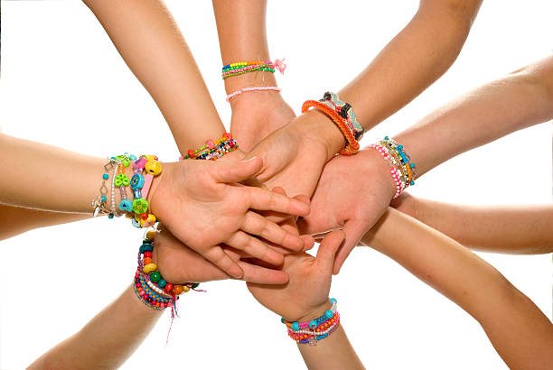 Bracelets Children hands. bracelet stock pictures, royalty-free photos & images