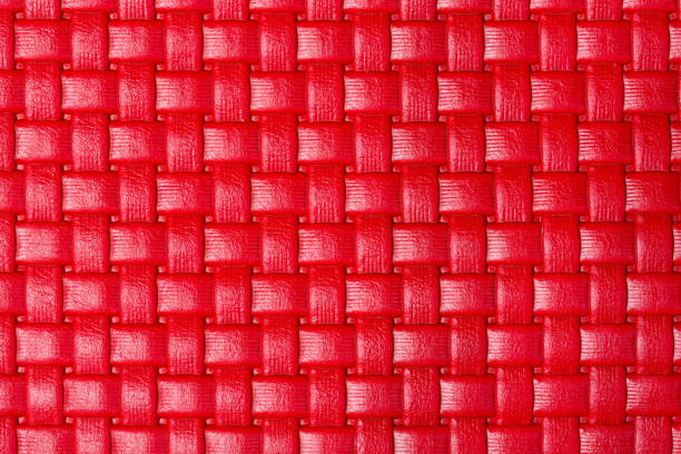 Braided bright red leather texture Braided bright red leather texture. High resolution photo. knobby knees stock pictures, royalty-free photos & images