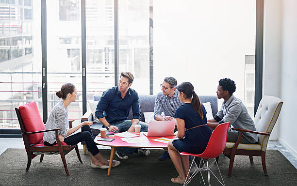 Brainstorming session in progress Shot of a group of coworkers in a meeting in an officehttp://195.154.178.81/DATA/i_collage/pi/shoots/785252.jpg casual clothing stock pictures, royalty-free photos & images