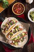 Healthy Tacos with Braised Beef, Lime, Cilantro, Avocado and Radish in Flour Tortillas
