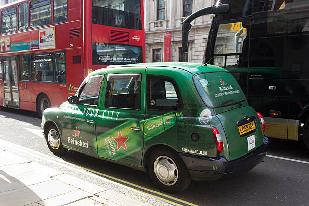 Branded taxi cab in the streets of London stock photo
