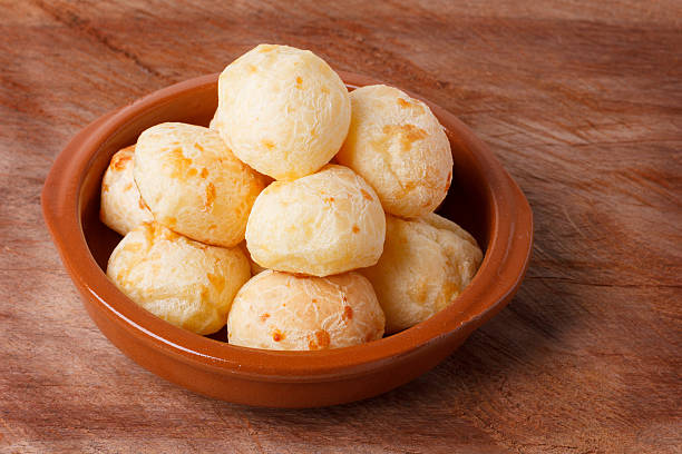 Brazilian snack cheese bread (pao de queijo) in bowl stock photo