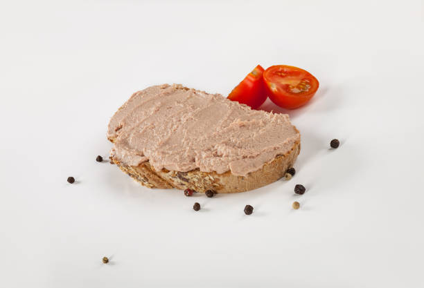 Bread and pate Bread and pate on white liver pâté photos stock pictures, royalty-free photos & images