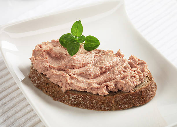 Bread and pate Slice of whole wheat bread and pate liver pâté photos stock pictures, royalty-free photos & images