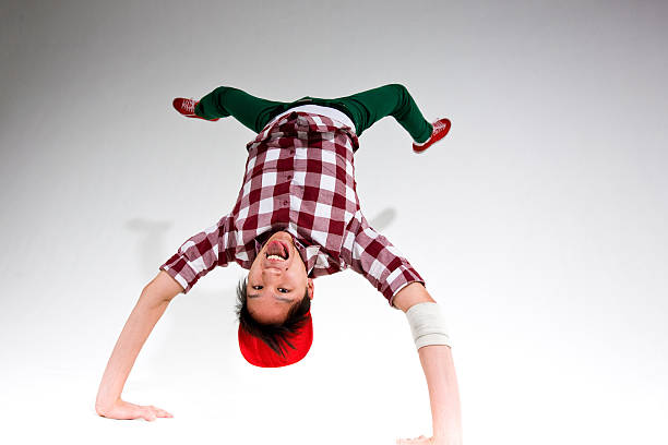 break dancer doing a handstand stock photo