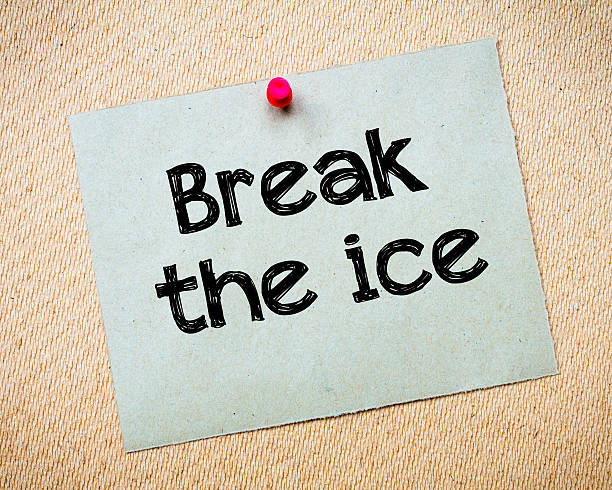 Break the ice Break the ice Message. Recycled paper note pinned on cork board. Concept Image breaking the ice stock pictures, royalty-free photos & images